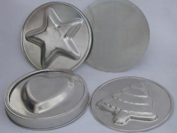 catalog photo of never used vintage holiday cake pan, round 9'' w/ changeable designs on top