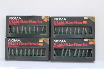 catalog photo of new in box vintage NOMA Christmas lights w/ flicker flame candle type light bulbs, white lights