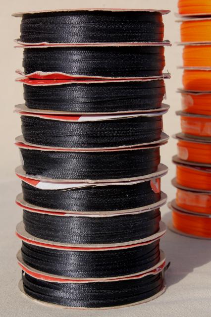 photo of new old stock lot narrow woven edge satin baby ribbon, Halloween colors orange & black #10