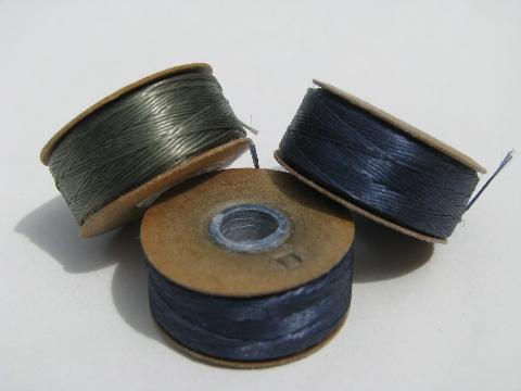 photo of new old stock military surplus nylon thread spools, drab green, navy #3