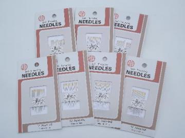 catalog photo of new old stock sewing notions lot self-threading needles sealed pkgs