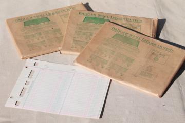 catalog photo of new old stock vintage ledger book sheets, blank lined paper for altered art paper or craft