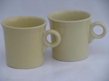 catalog photo of newer Homer Laughlin Fiesta ring handle mugs, pale yellow (not sunflower)