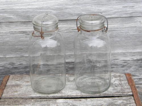 photo of old 2 qt storage canister jars w/glass lids, Cleveland Fruit Juice Co #1