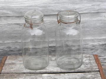 catalog photo of old 2 qt storage canister jars w/glass lids, Cleveland Fruit Juice Co