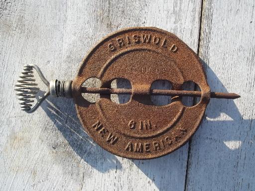 photo of old Griswold cast iron stove damper, vintage New American 6 inch damper #1