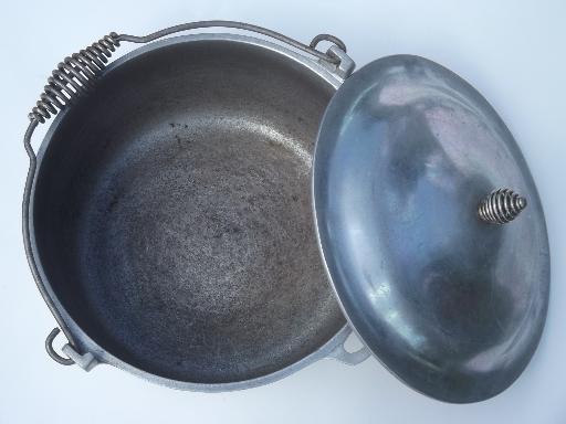 photo of old Majestic cast aluminum dutch oven w/ spun wire handles for wood stove #5