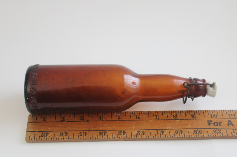 photo of old Oshkosh Peoples Brewing amber glass beer bottle with wire bail porcelain top  #8