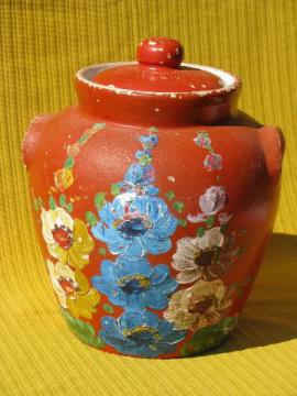 catalog photo of old Ransburg stoneware cookie jar crock, handpainted flowers on orange