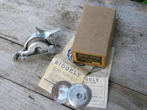 photo of old Ridgely Trimmer model D w/extra blades, original box and advertising #1