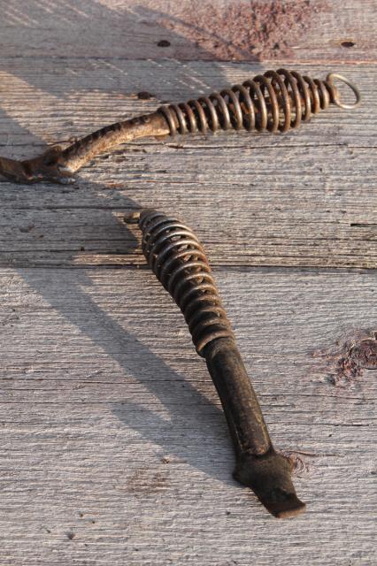 photo of old Stover & Monarch wood stove tools, lifter handles for burner hot plates, coal grate handle #2