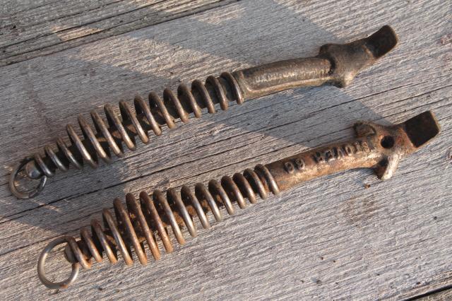 photo of old Stover & Monarch wood stove tools, lifter handles for burner hot plates, coal grate handle #3