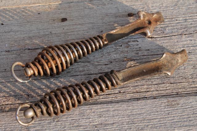 photo of old Stover & Monarch wood stove tools, lifter handles for burner hot plates, coal grate handle #5