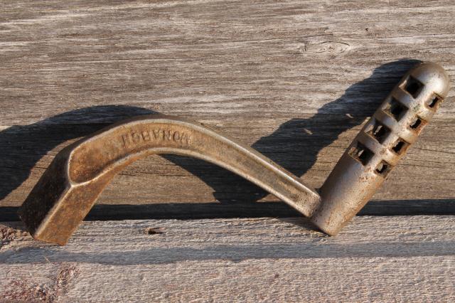 photo of old Stover & Monarch wood stove tools, lifter handles for burner hot plates, coal grate handle #6