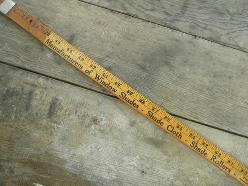 photo of old adjustable advertising ruler for measuring window opening for shades #3