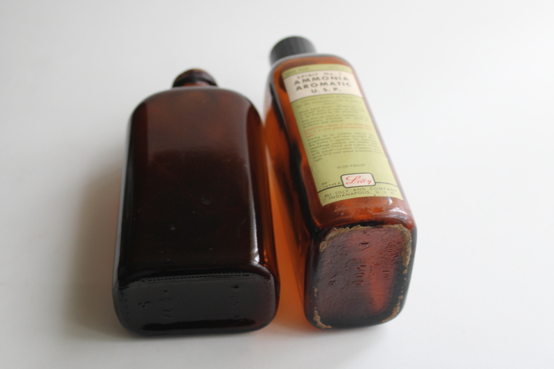 photo of old amber brown glass pharmacy bottles, drugstore medicine bottle w/ label Ammonia Aromatic  #5