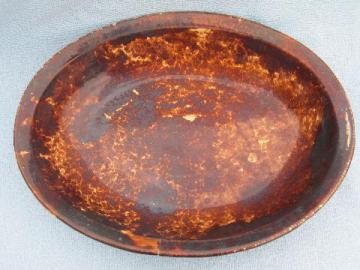 catalog photo of old antique Bennington pottery, large oval bowl w/ rockingham glaze