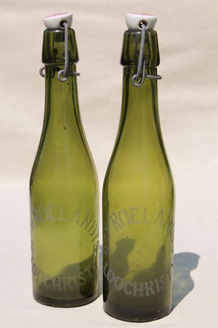 photo of old antique Dutch beer or seltzer water bar bottles, green glass w/ porcelain wire bail lids #2