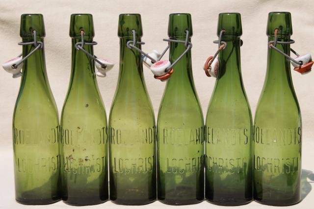 photo of old antique Dutch beer or seltzer water bar bottles, green glass w/ porcelain wire bail lids #17