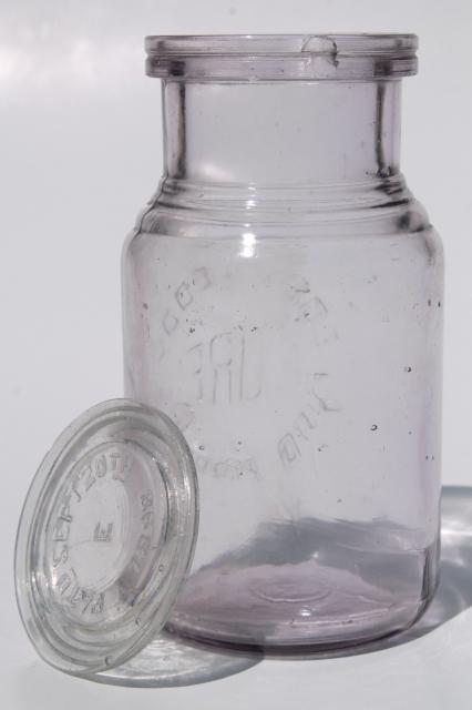 photo of old antique Eddy Pure Food Products embossed glass bottle w/ glass jar lid  #4