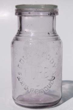 catalog photo of old antique Eddy Pure Food Products embossed glass bottle w/ glass jar lid 