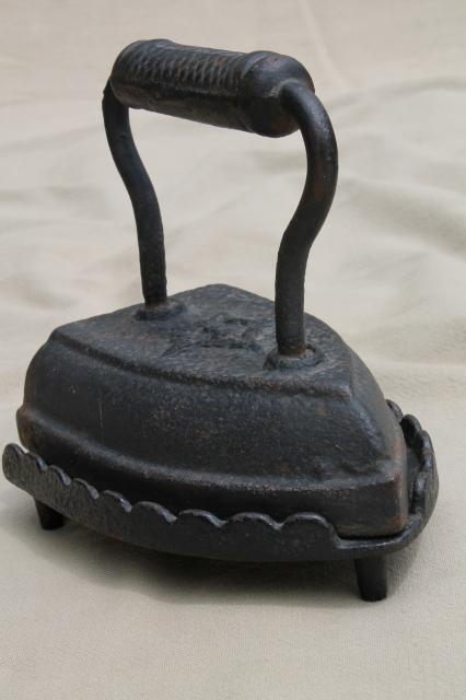 photo of old antique Geneva star clothes iron & cast iron trivet stand #1
