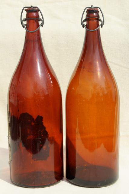 photo of old antique amber glass beer bottles, magnum size wine bottles w/ wire bail lids #3