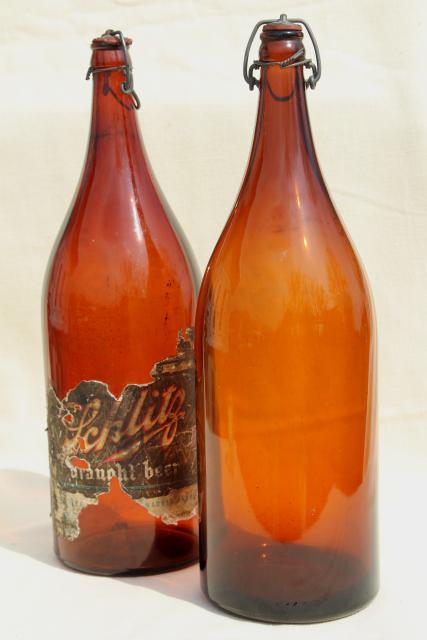 photo of old antique amber glass beer bottles, magnum size wine bottles w/ wire bail lids #4