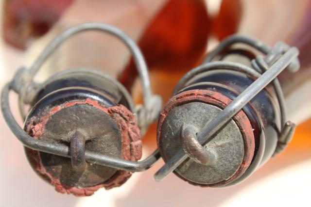 photo of old antique amber glass beer bottles, magnum size wine bottles w/ wire bail lids #8