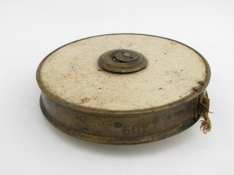 photo of old antique brass and cloth 50ft tape measure, surveyor / carpenter's tool #2