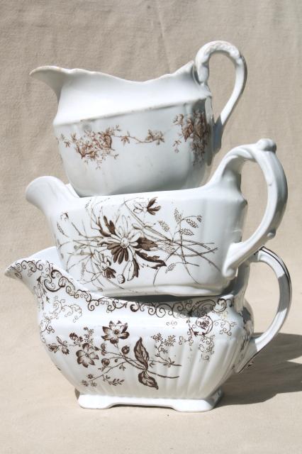 photo of old antique brown transferware china collection, sauce pitchers & gravy boats #1