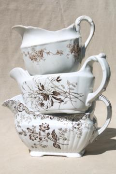 catalog photo of old antique brown transferware china collection, sauce pitchers & gravy boats