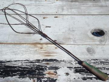 catalog photo of old antique carpet rug beater, primitive vintage wire tool w/ wood handle