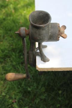 catalog photo of old antique cast iron meat grinder, hand crank Eclipse patented 1899 & 1905, paw foot potbelly shape 