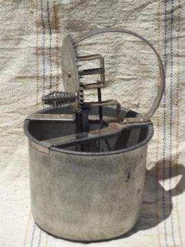 catalog photo of old antique egg beater, tinned steel bowl and hand-crank whipper beaters
