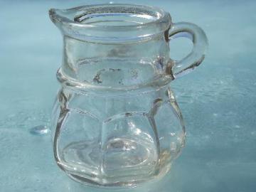 catalog photo of old antique flint glass syrup jug or cruet bottle, faintly sun purple