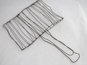 catalog photo of old antique handmade wirework grilling basket, vintage campfire cooker w/ wire handle