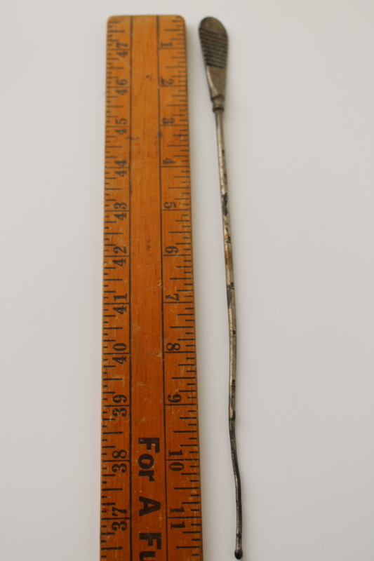 photo of old antique lab measure stirrer rod, steampunk vintage scientific laboratory equipment, metal stir stick  #1