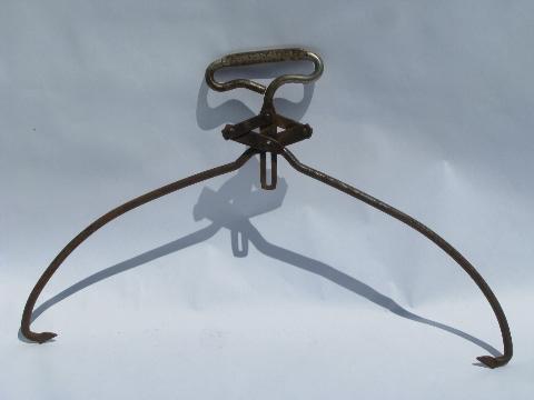 photo of old antique primitive iron ice tongs, vintage Wisconsin Ice & Coal #1