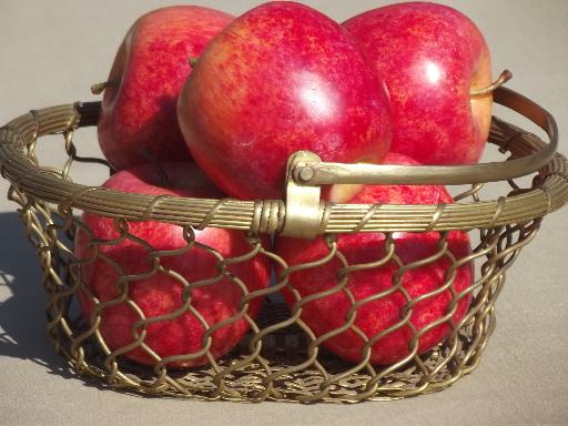 photo of old brass basket full of autumn apples, rustic fruit centerpiece for fall  #3