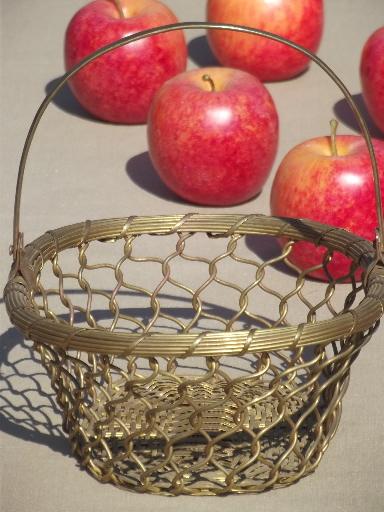 photo of old brass basket full of autumn apples, rustic fruit centerpiece for fall  #4