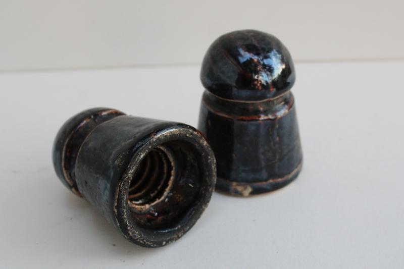 photo of old brown glazed ceramic insulators, rustic vintage primitive spools junk style #2