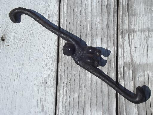 photo of old cast iron figural monkey hanging hook coat hanger, vintage Japan #2