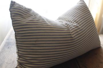 catalog photo of old chicken feather pillow, vintage indigo blue striped cotton ticking fabric cover