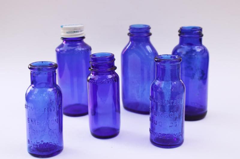 photo of old cobalt blue glass medicine bottles, embossed Bromo-Seltzer, vintage Milk of Magnesia #1