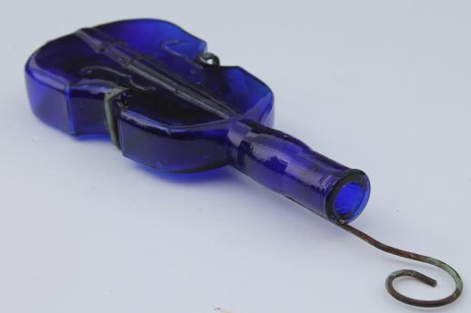 photo of old cobalt blue glass violin bottle w/ wire wall rack for display #6