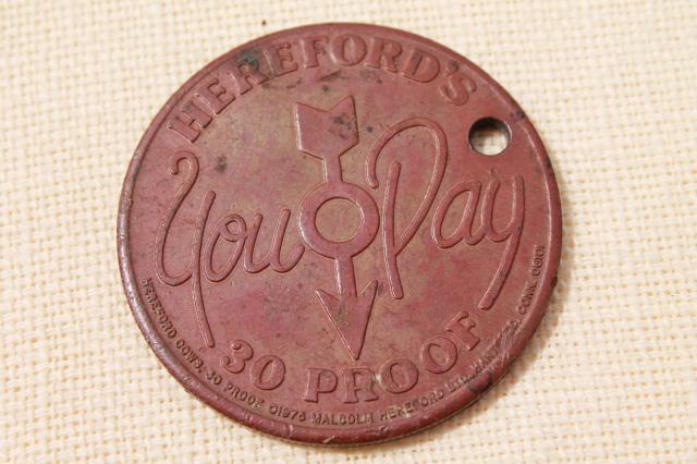 photo of old copper coin Hereford's whiskey advertising token, Hereford cattle cow or bull #2