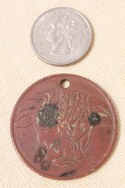 photo of old copper coin Hereford's whiskey advertising token, Hereford cattle cow or bull #3