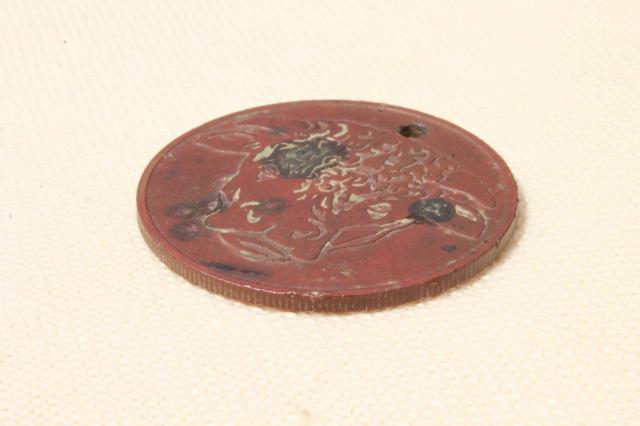 photo of old copper coin Hereford's whiskey advertising token, Hereford cattle cow or bull #4