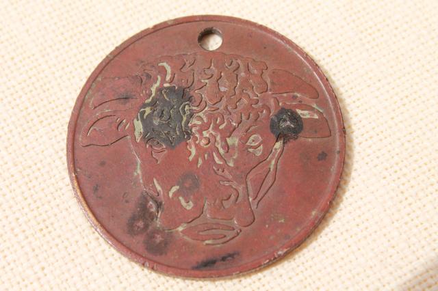 photo of old copper coin Hereford's whiskey advertising token, Hereford cattle cow or bull #5